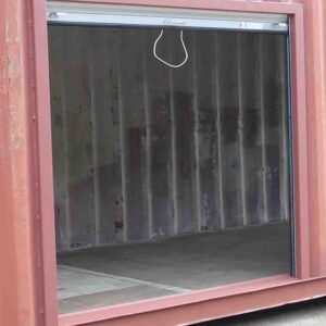 8′ Wide x 7′ 4″ Tall Roll Door In High Cube Container Side